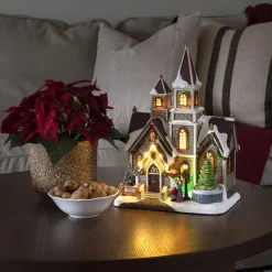 Juledekorasjon>Konstsmide Hus med roterende juletre og musikk LED Flerfarget